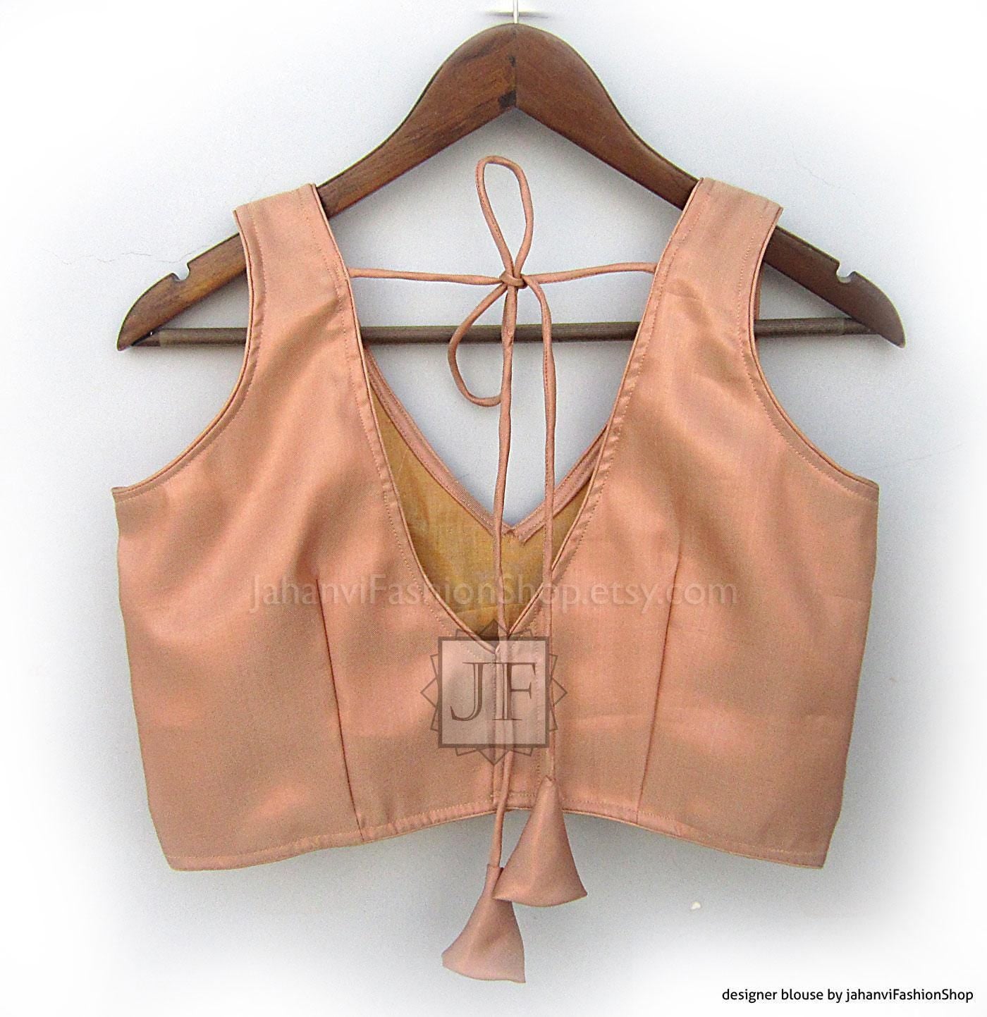 Peach silk blouse, sleeveless V-neck, open back with tie
