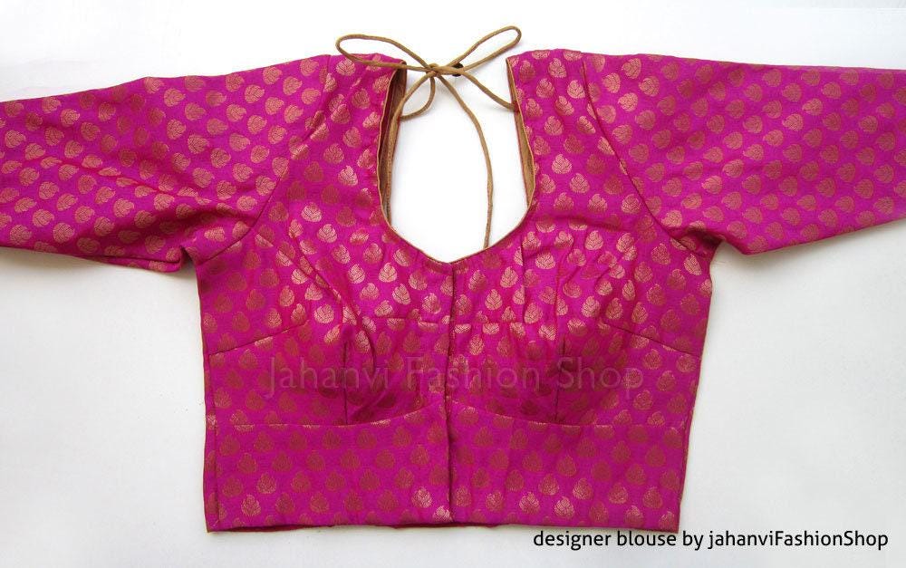 Magenta brocade blouse with gold motifs, long sleeves, keyhole back and tie neckline