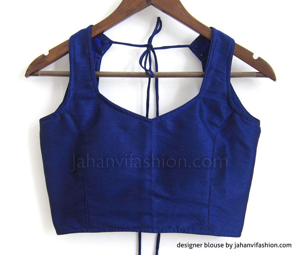 Royal blue sleeveless saree blouse with open back and tie halter neckline