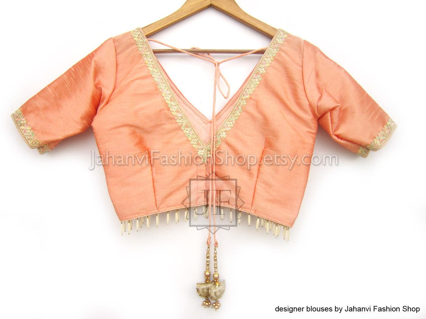 Peach Dupion Silk V-Neck Princess Cut Half Sleeves Designer Golden Lace On Neck & Sleeves Tassel Tie-Up, Party Wear Bridal Saree Blouse