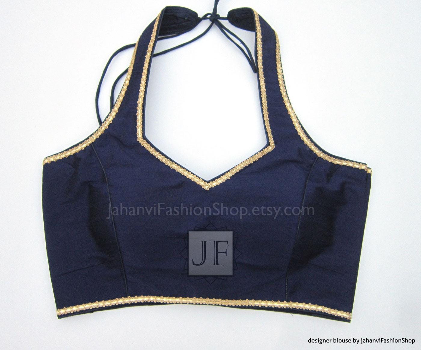 Navy halter neck sleeveless crop blouse with gold trim and square neckline