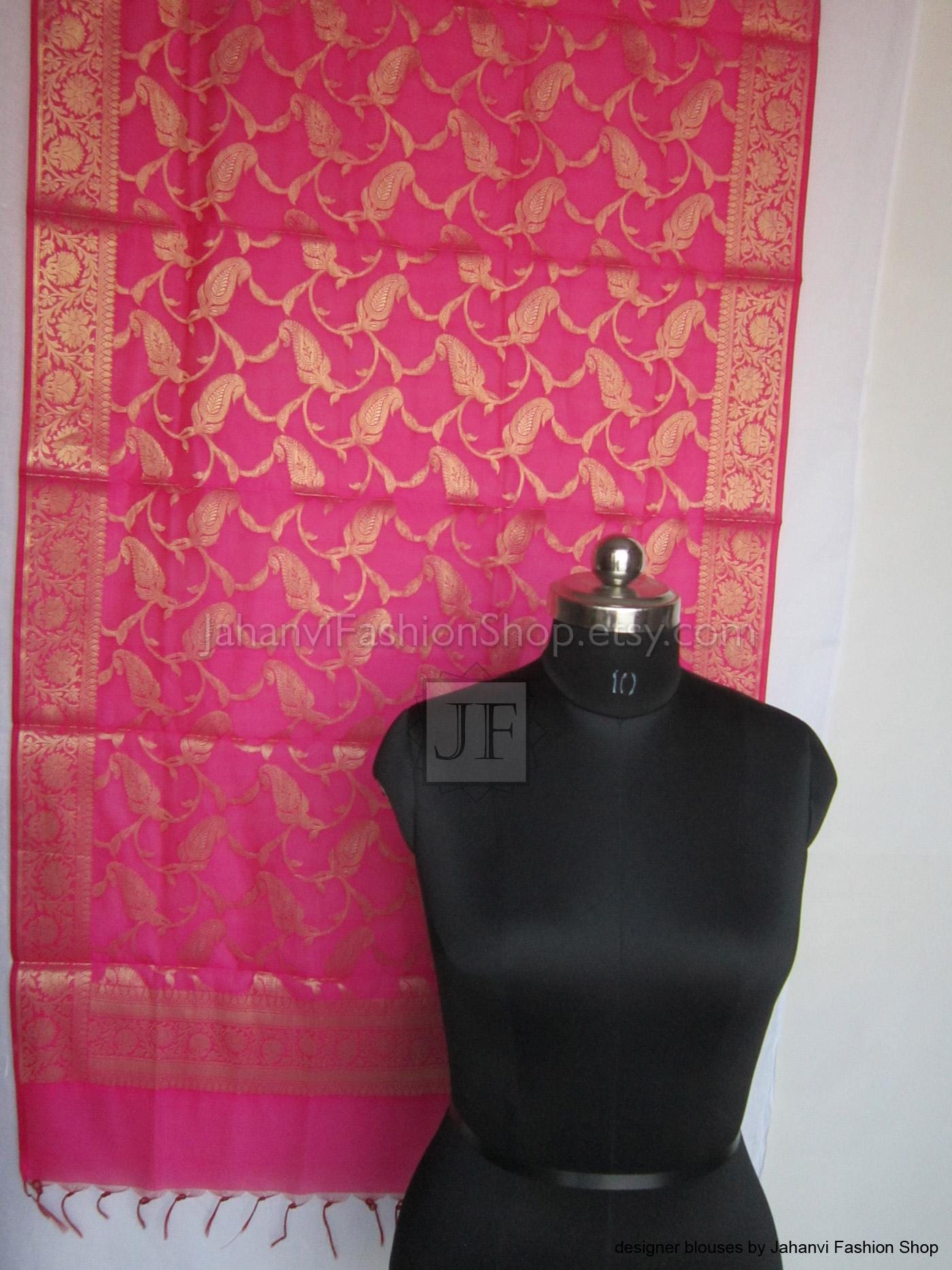 Magenta dupatta with allover gold floral pattern and wide decorative border, fringed edges