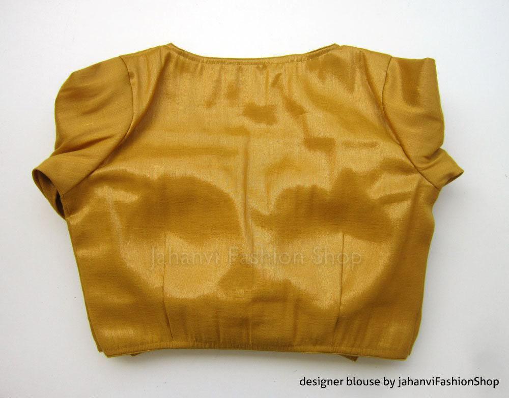 Golden shimmer saree blouse back with gathered shoulders