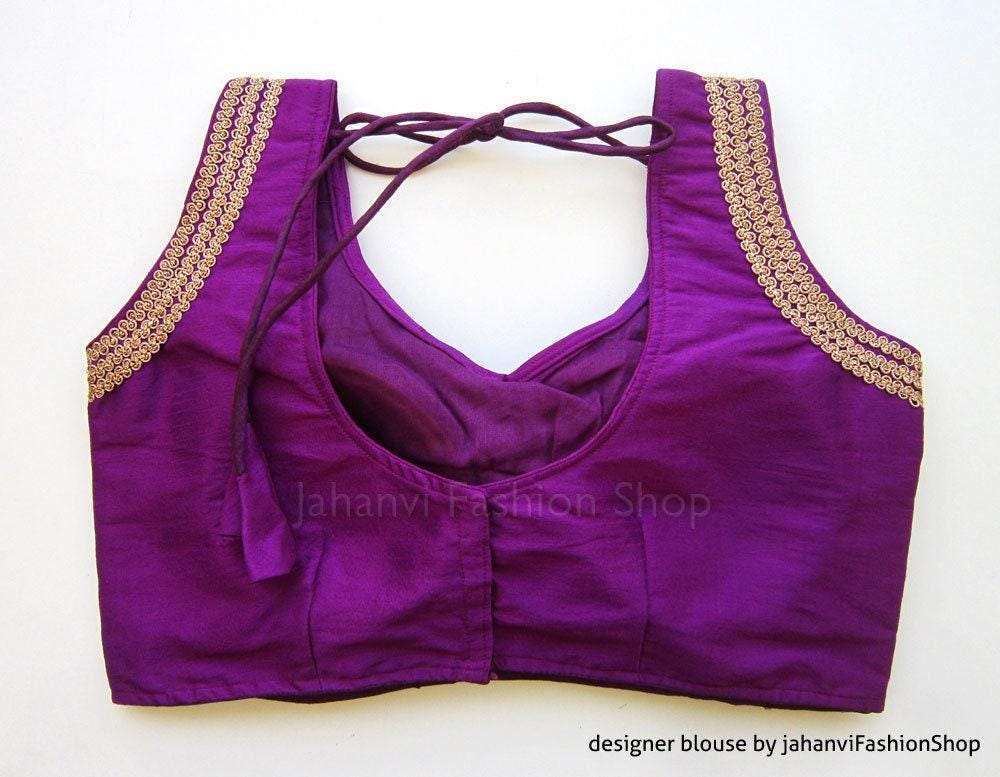 Violet sweetheart-neck blouse with gold scalloped trim and crisscross tie neckline