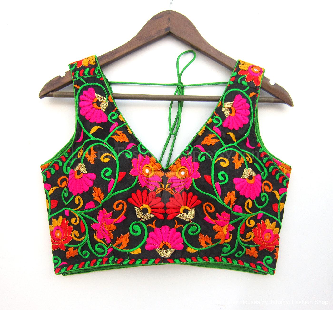Embroidered V-neck saree blouse, dark fabric with colorful floral thread and green trim