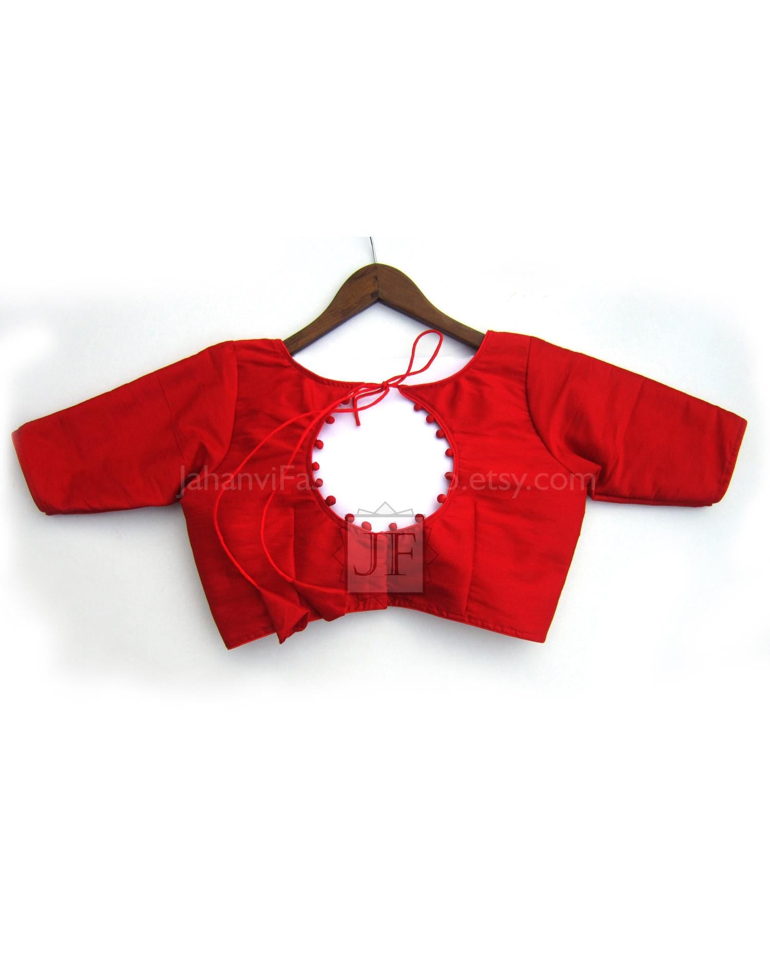 Red dupion silk blouse with V-neck, short sleeves, and back hook closure