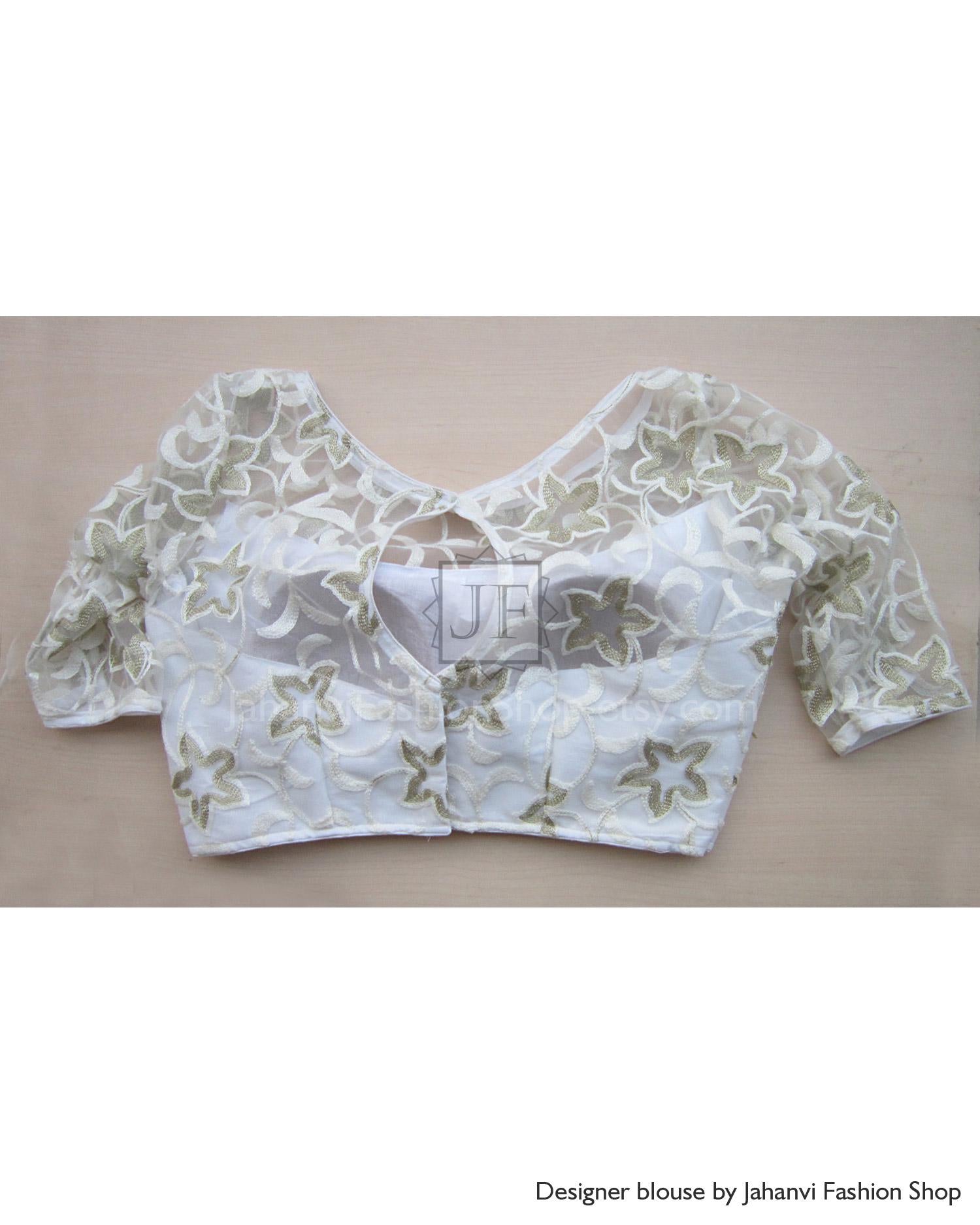 White sheer embroidered crop blouse with keyhole V-neck and 3/4 sleeves, floral leaf motif
