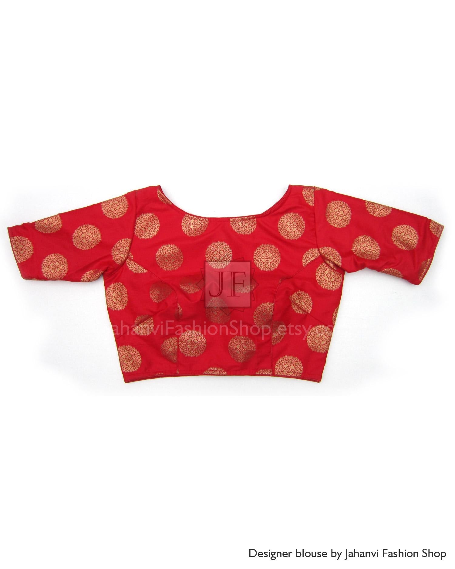 Red boat-neck brocade saree blouse with gold circular motifs, half sleeves.