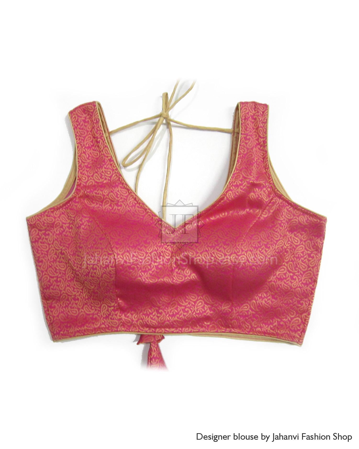 Pink V-neck saree blouse, sleeveless with tie-back straps and patterned fabric