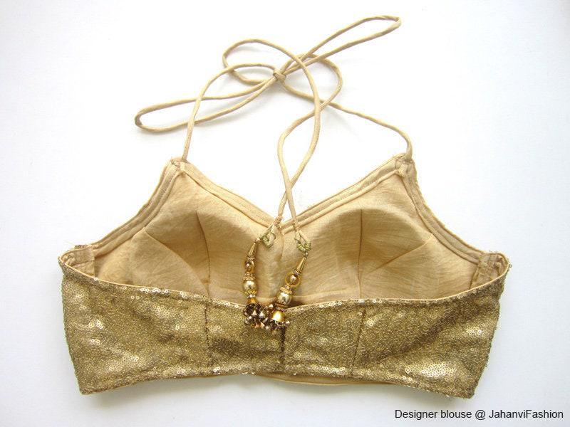 Gold sequin halter blouse with tie straps and open-back lining