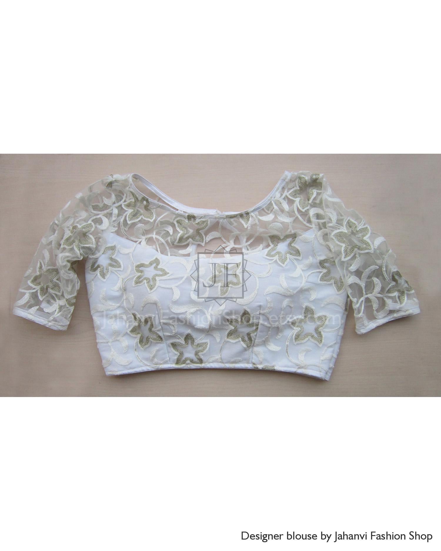 White sheer embroidered crop blouse with V-neck, short sleeves, and floral leaf motif