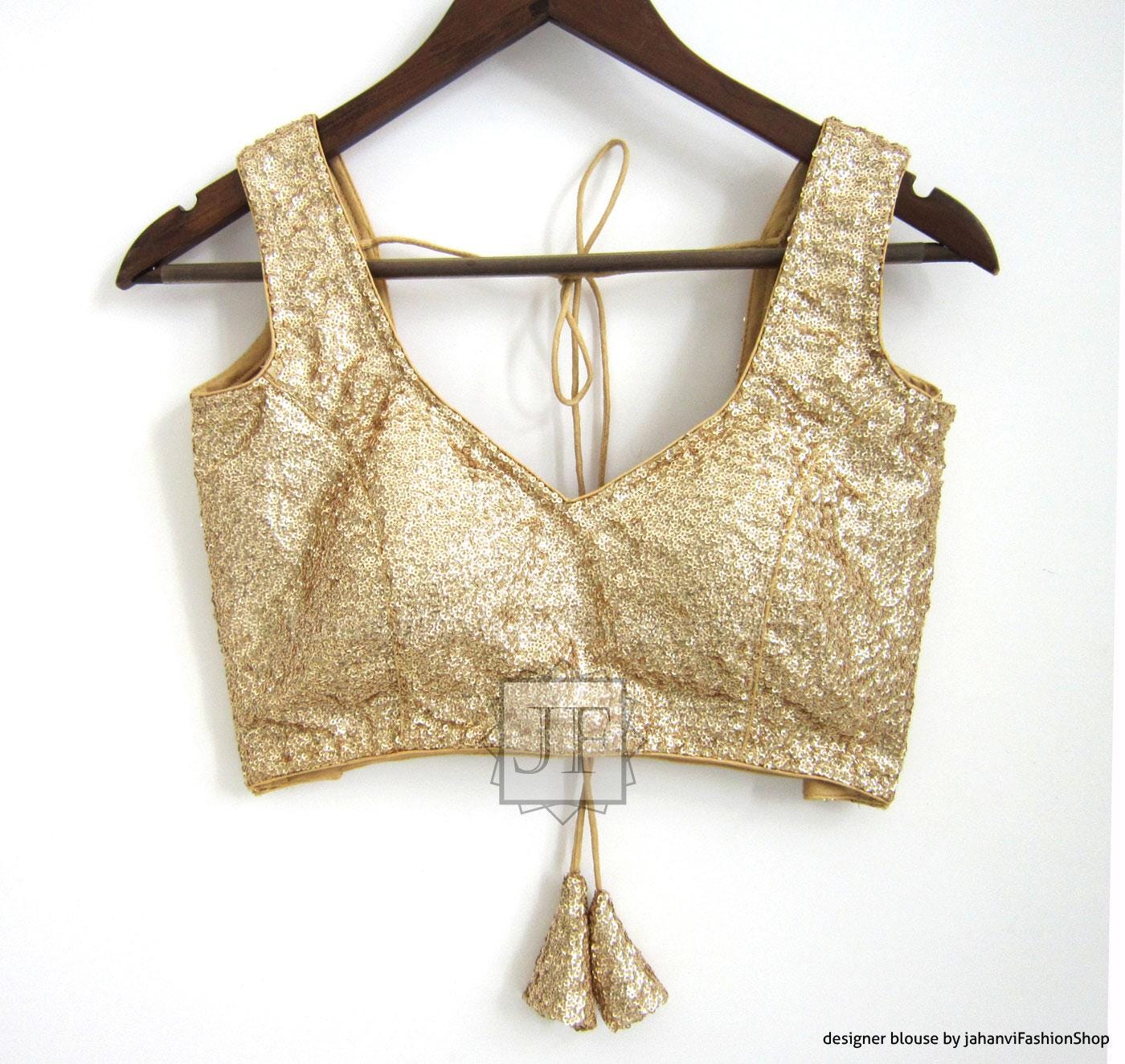 Gold sequin saree blouse top with V-neck front, sleeveless, and tassel ties back
