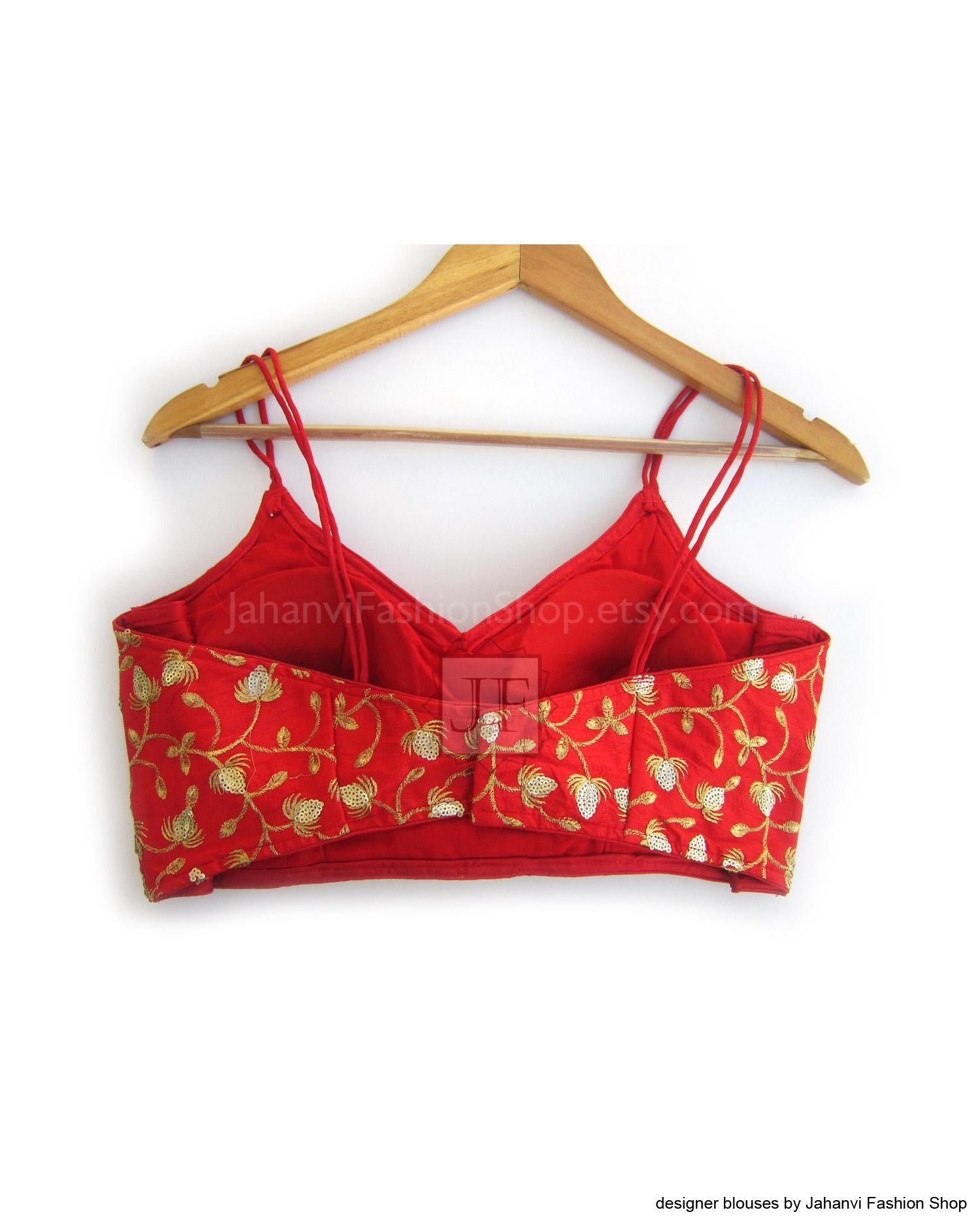 Red sari crop blouse with spaghetti straps and gold floral embroidery detail
