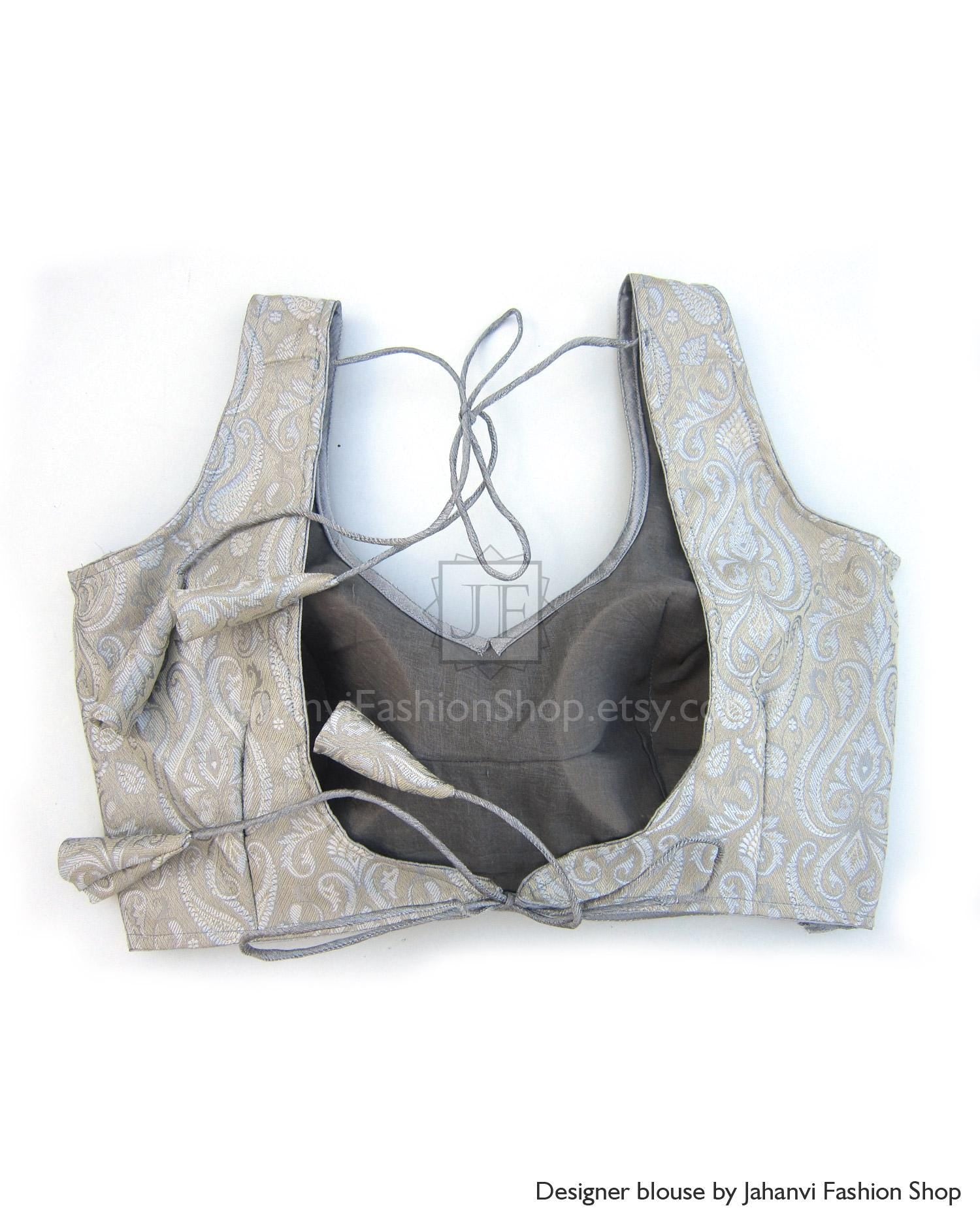 Backless brocade saree blouse with lace-up tie back, gold and cream jacquard fabric