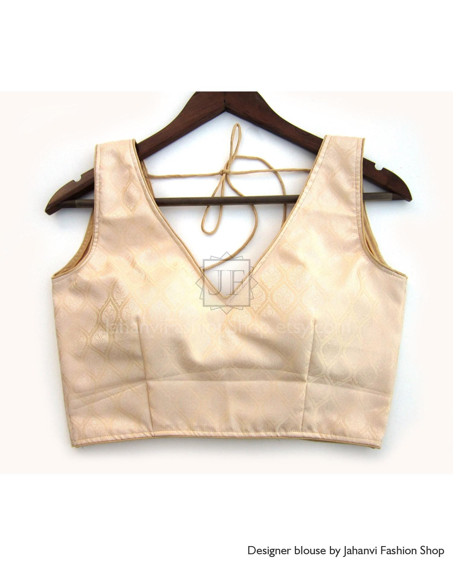 Gold-beige satin saree blouse with V-neck, sleeveless, open back tie