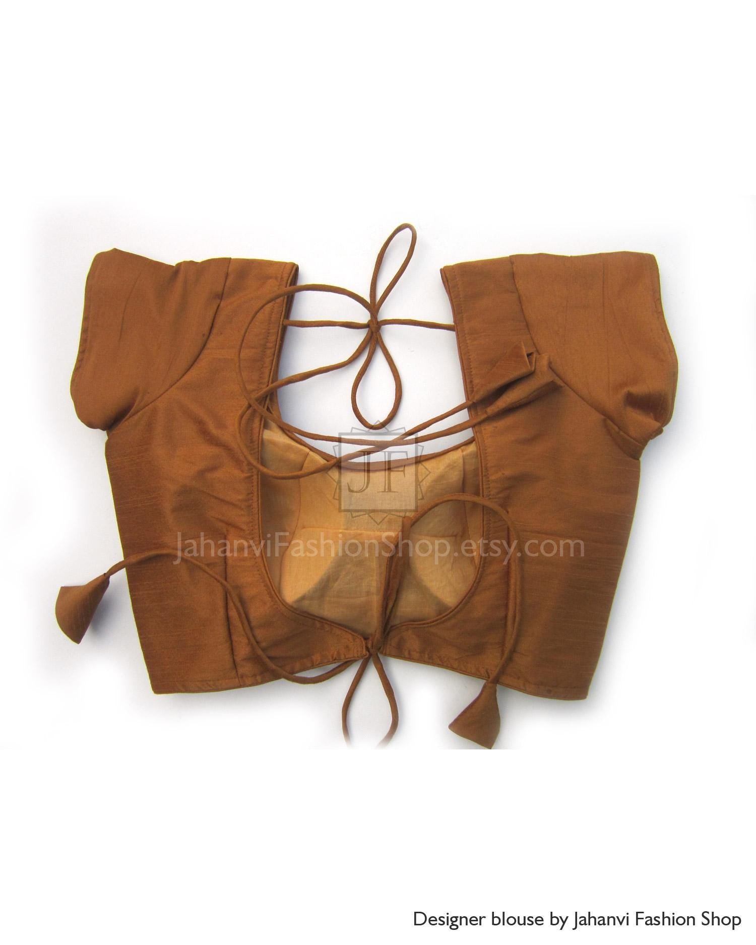 Brown round-neck saree blouse with short sleeves and lace-up neckline; drawstring ties