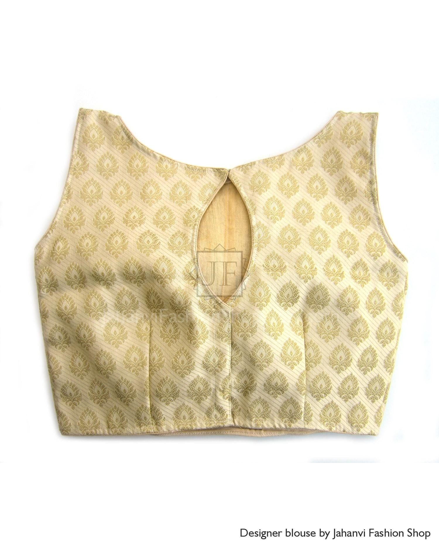 Sleeveless boat-neck brocade blouse in gold tone, open V-shaped back with slit