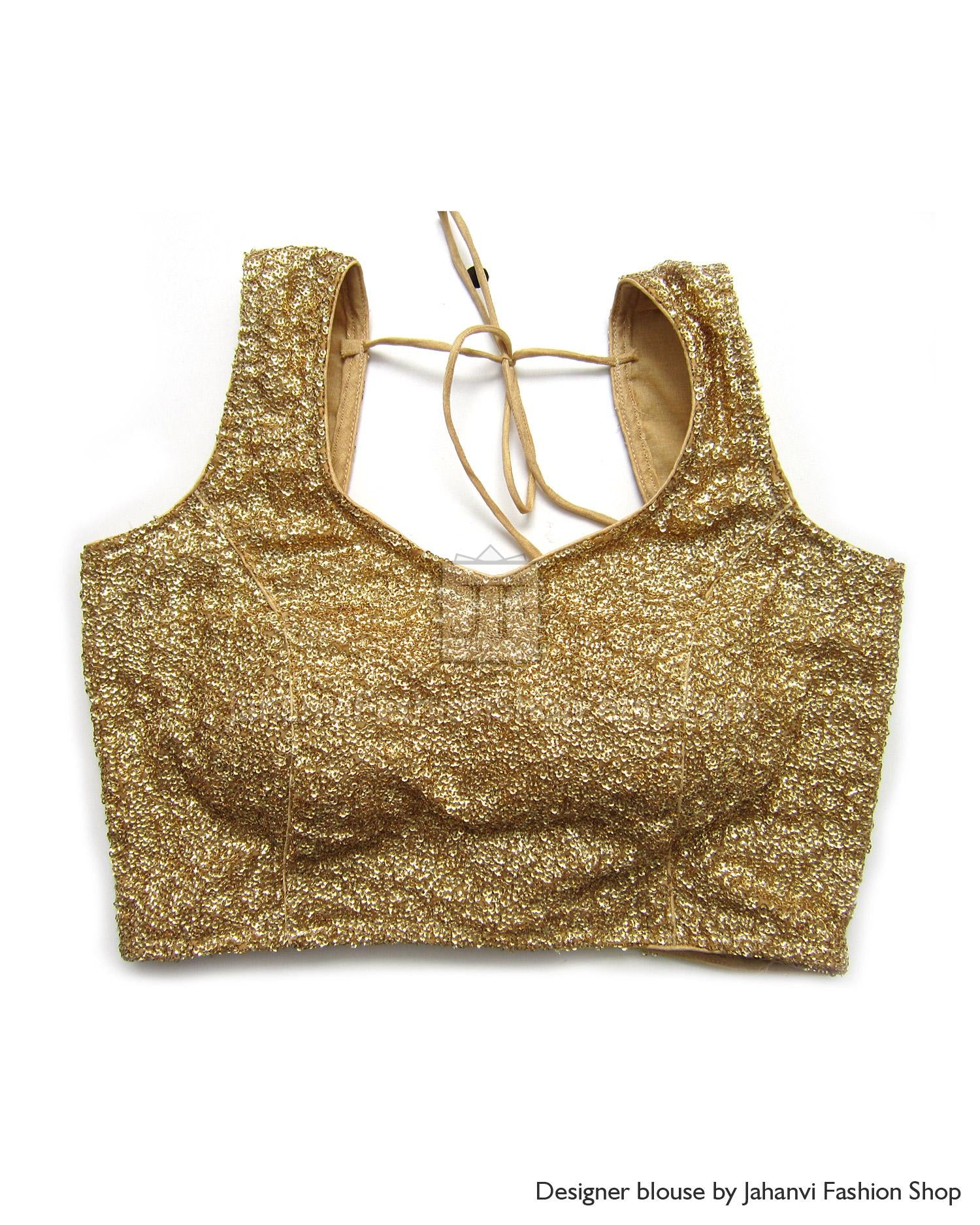 Gold sequin crop blouse with deep neckline and lace-up tie back