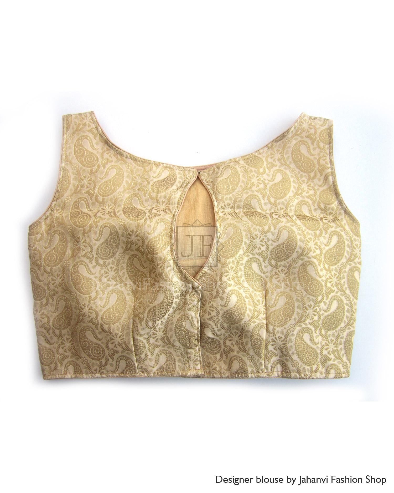 Back-open golden brocade saree blouse with sleeveless U-neck and center back slit