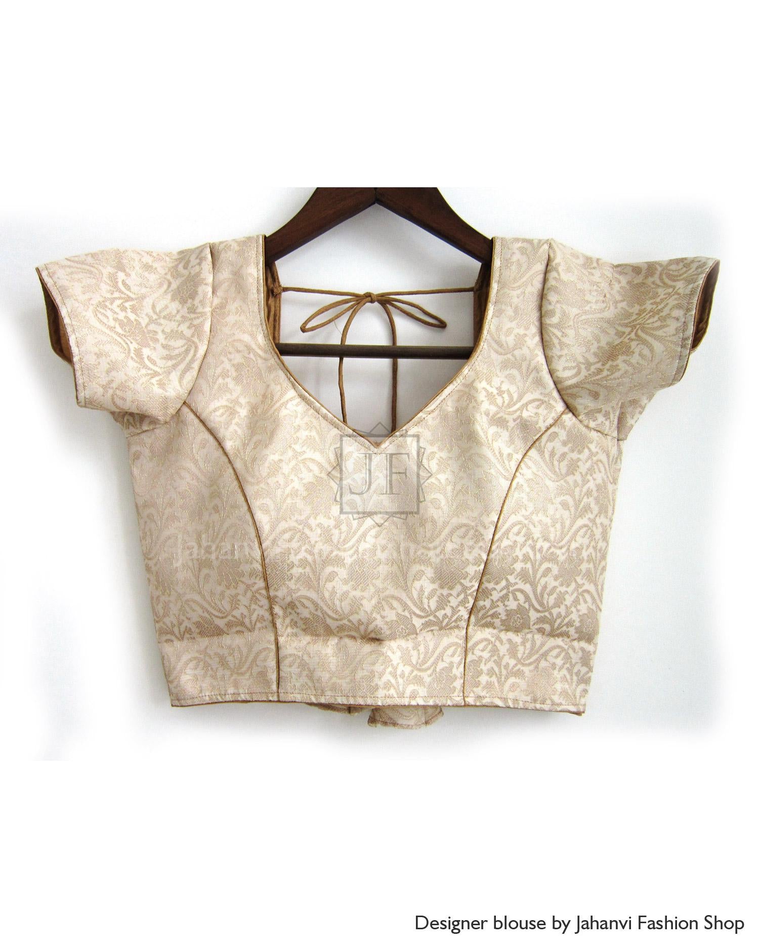 Golden brocade saree blouse with sweetheart neckline and short flared sleeves, front view