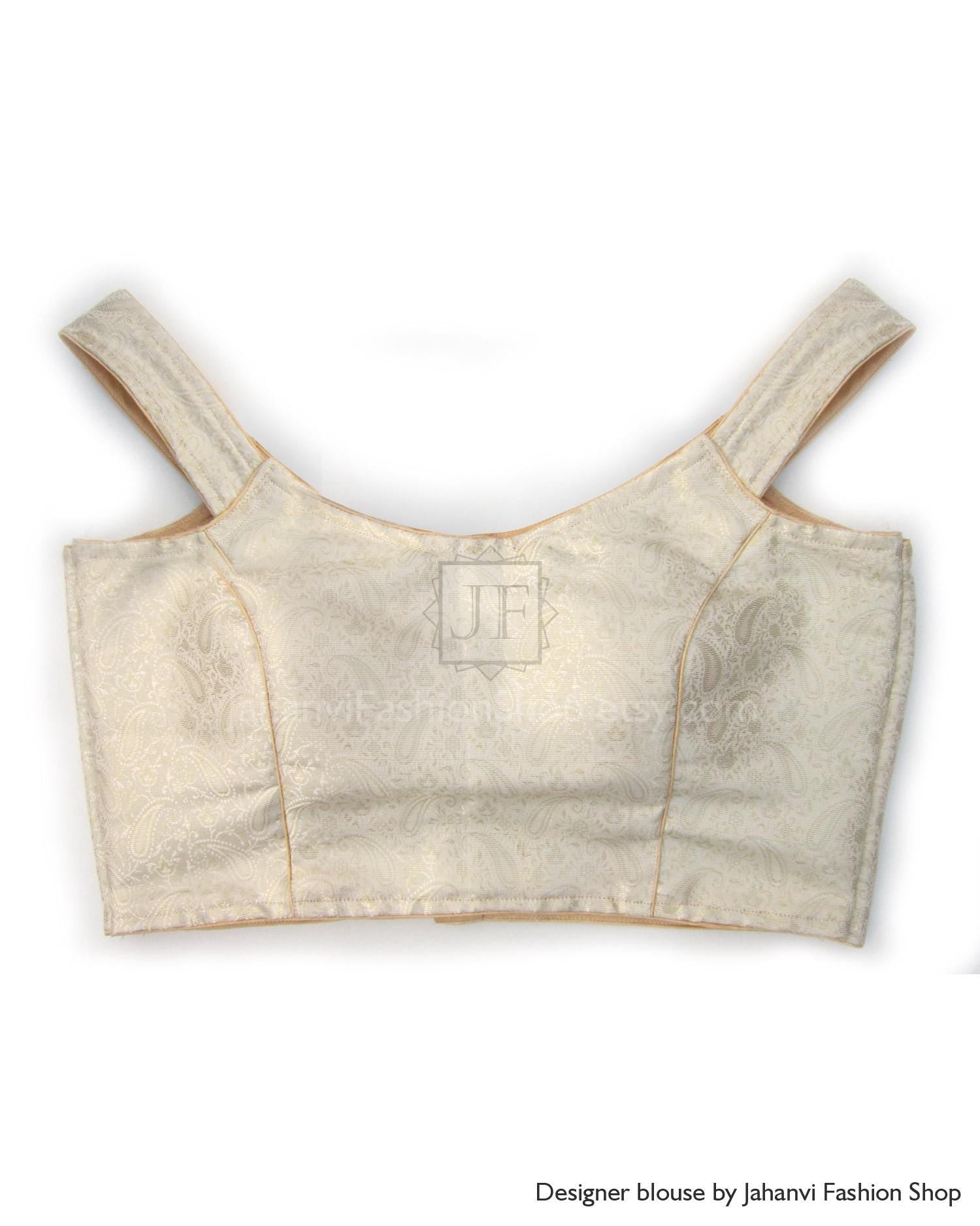 Off-shoulder saree blouse in light golden cream brocade with sleeveless wide straps