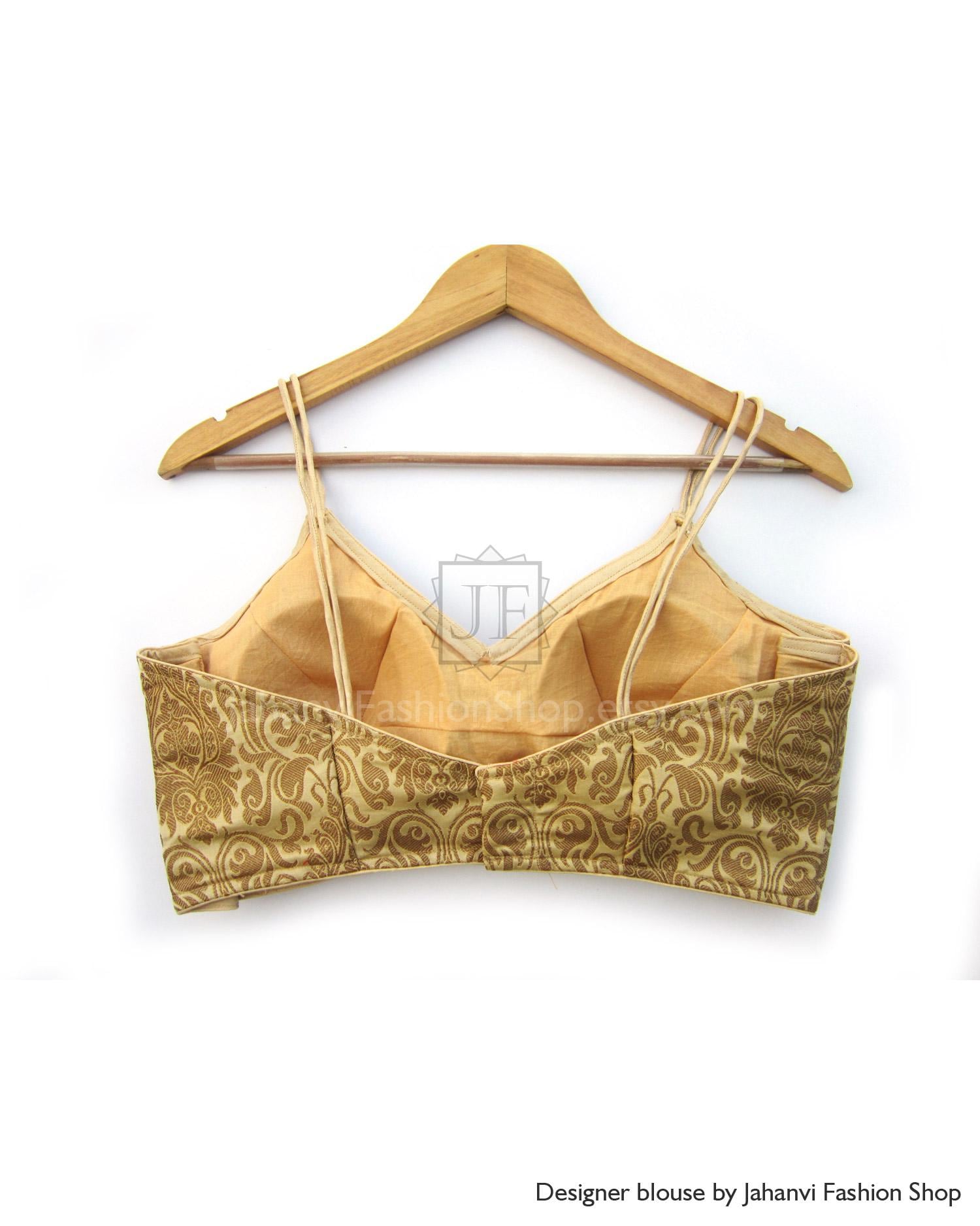Embellished strappy saree blouse, golden brocade design with thin straps and padded fit