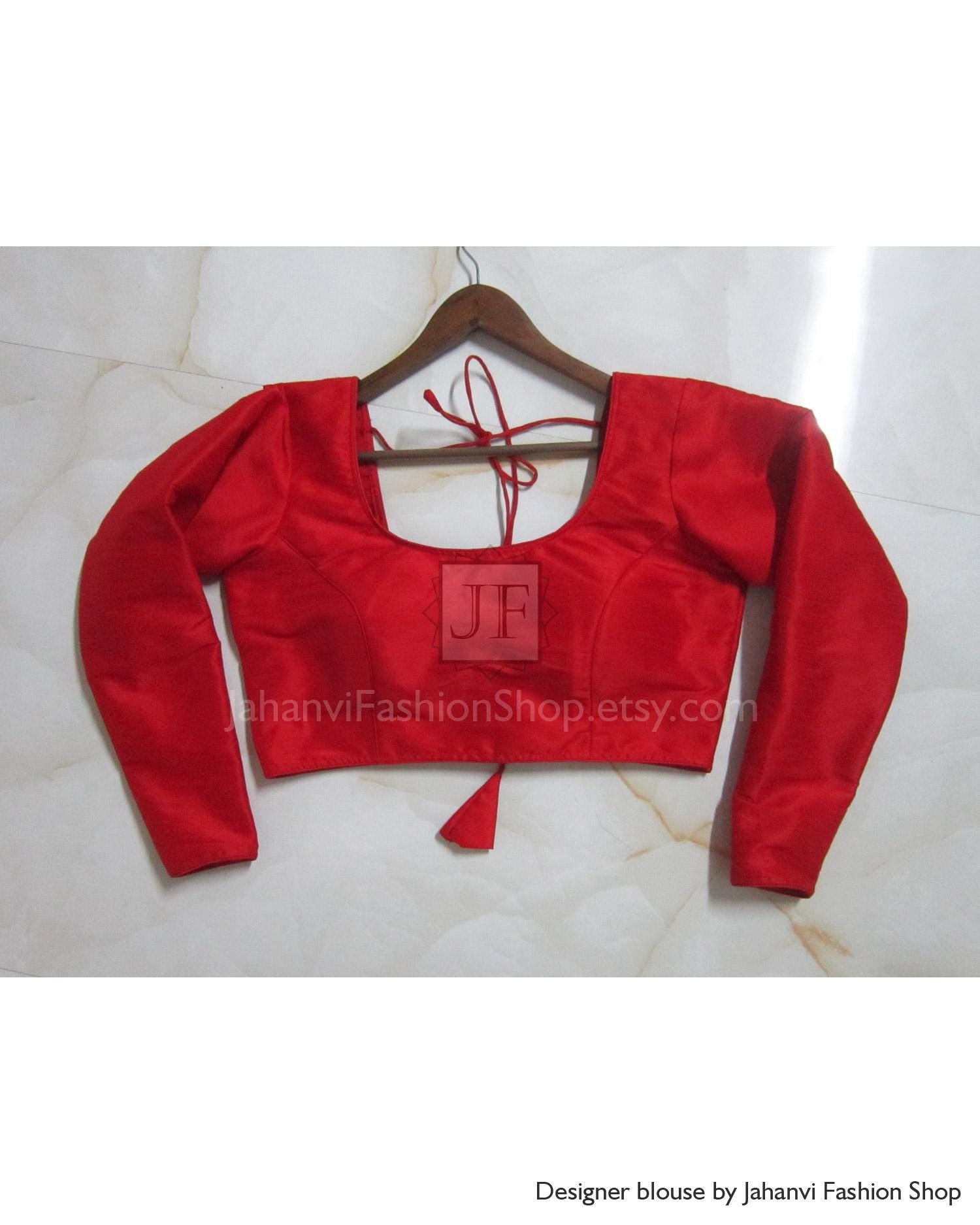 Red readymade saree blouse with full sleeves, square neckline, and back tie straps