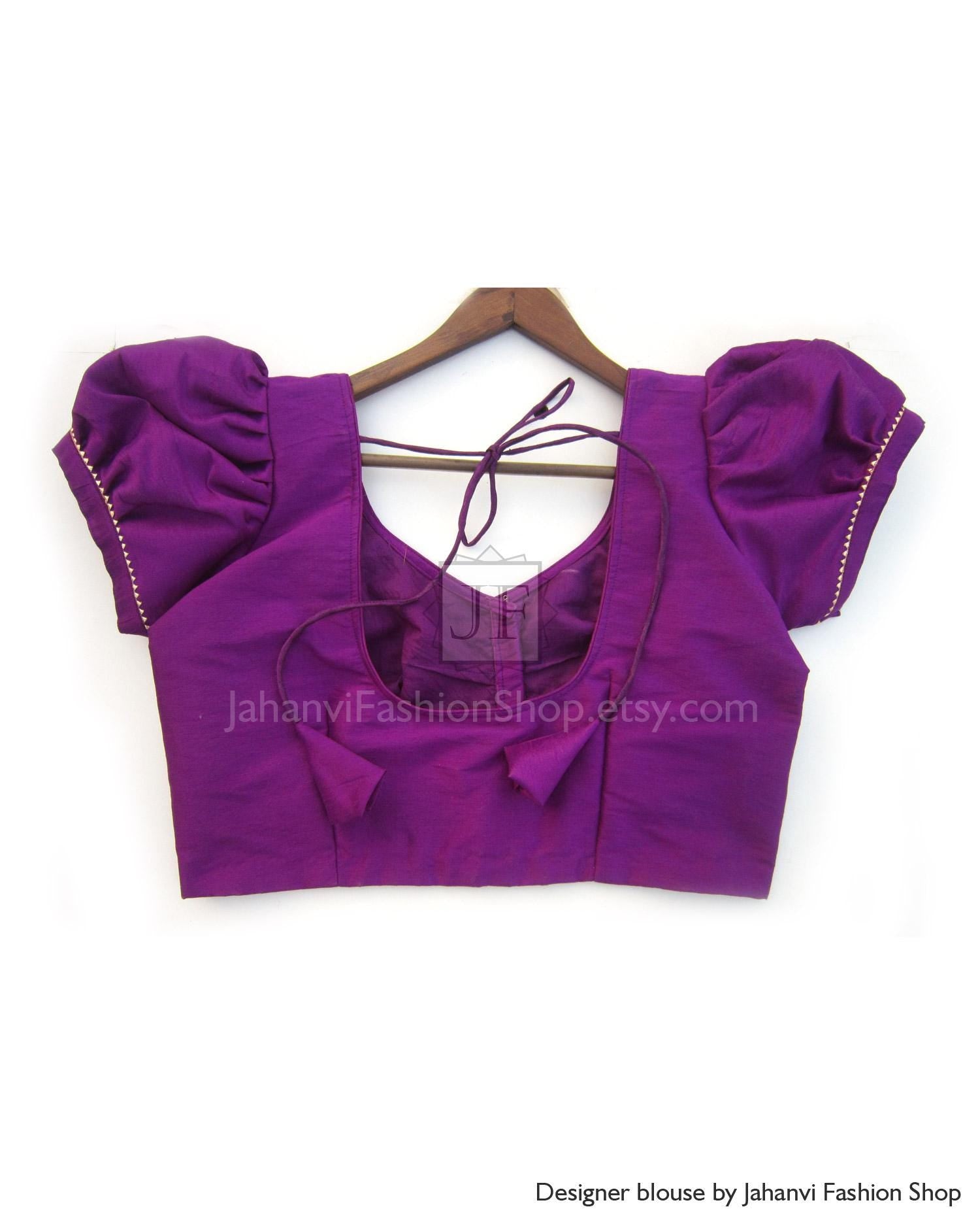 Purple puff sleeve saree blouse with tie-back straps and V-back neckline