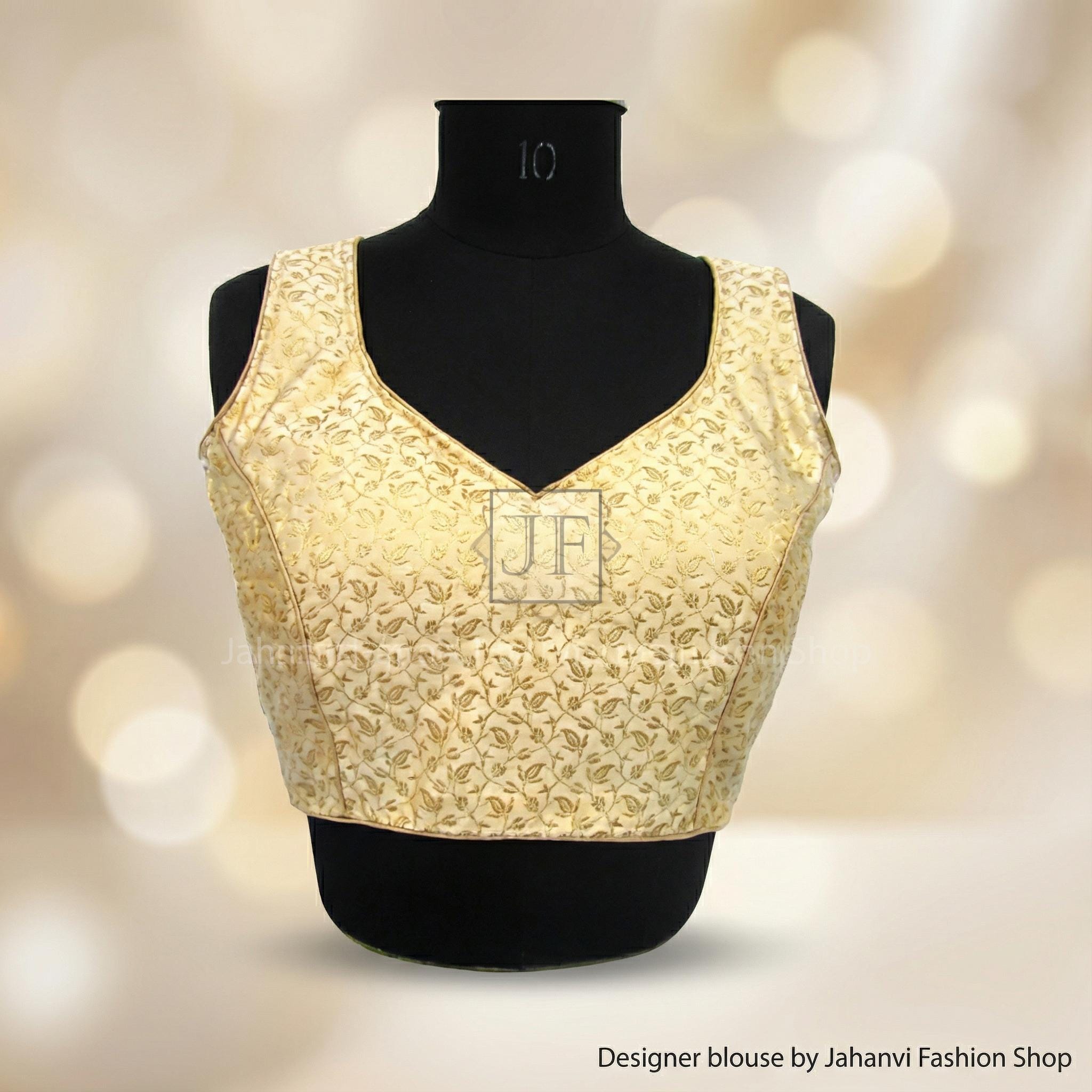 Gold brocade saree blouse crop top, sleeveless V-neck with fitted front panel