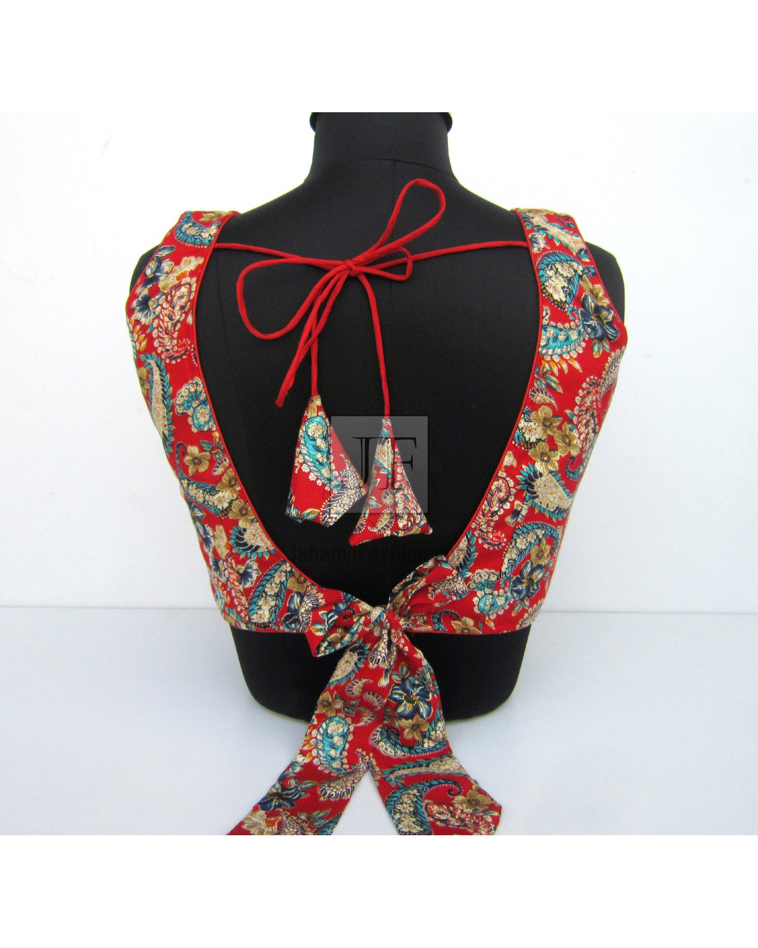 V-neck saree blouse with black back, red and turquoise patterned sleeves, back bow tie