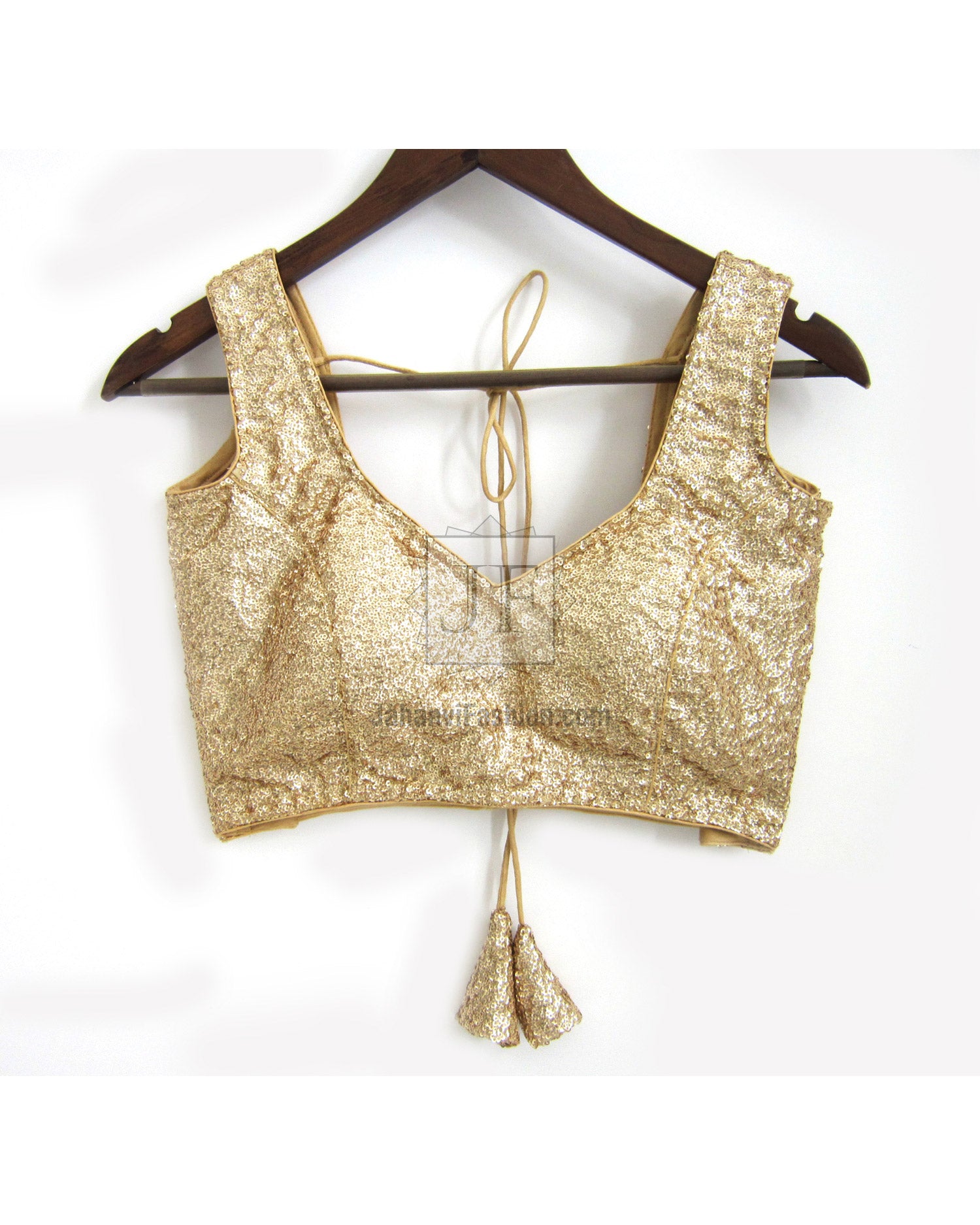 Gold sequin saree blouse top with U-back tie and tassel, sleeveless