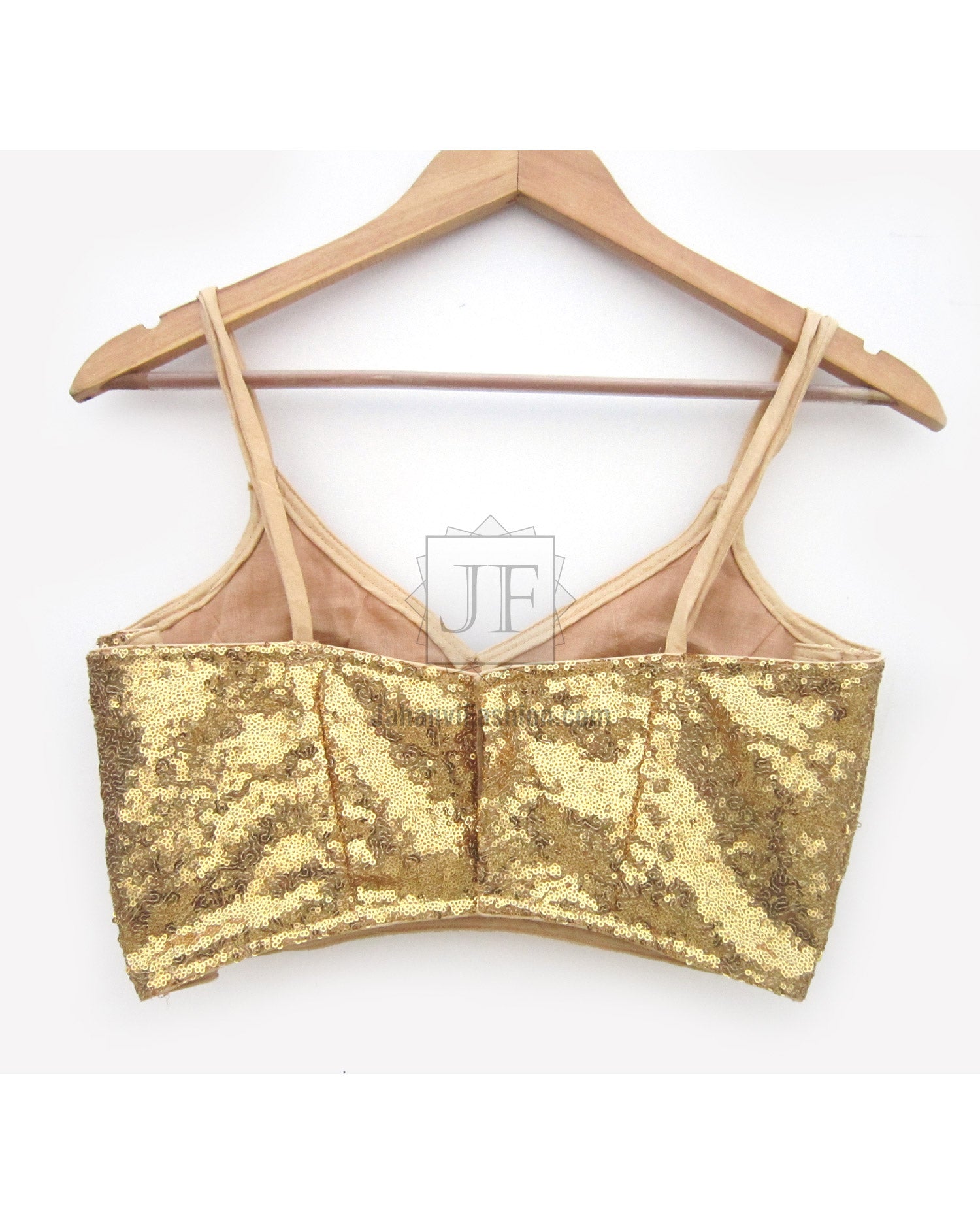 Gold sequin spaghetti strap saree blouse with V neckline and stitched fitted bodice