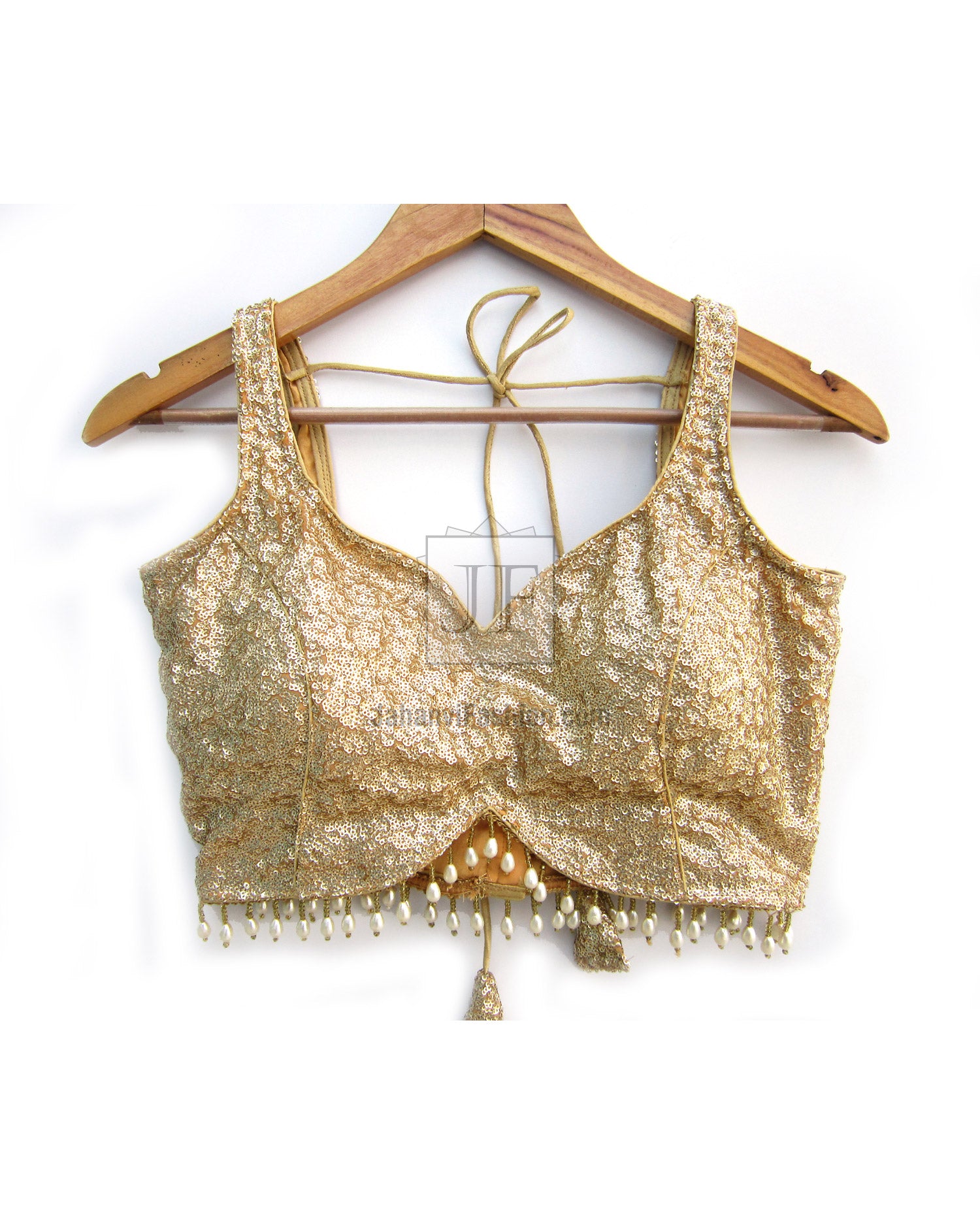 Gold sequin sleeveless saree blouse with deep V-back and beaded tie detail
