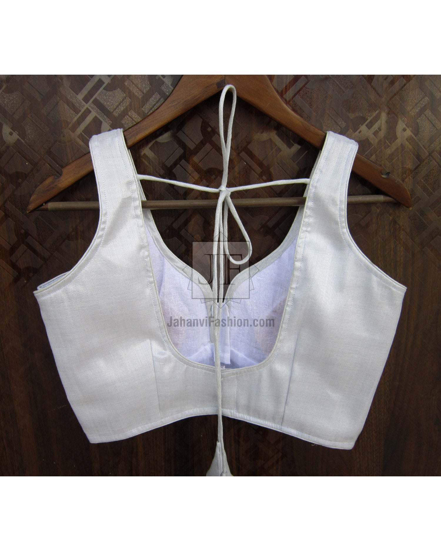 White sleeveless saree blouse crop top with sweetheart neckline, lace-up open back tie
